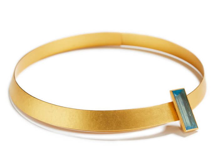 gold bangle with aquamarine jewel by Ulla and Martin Kaufmann