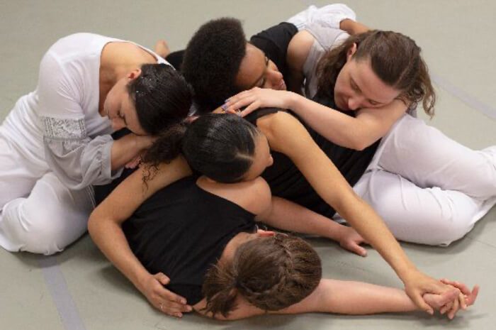 Five dancers in Keshet Dance Company's Movement for Mercy performance
