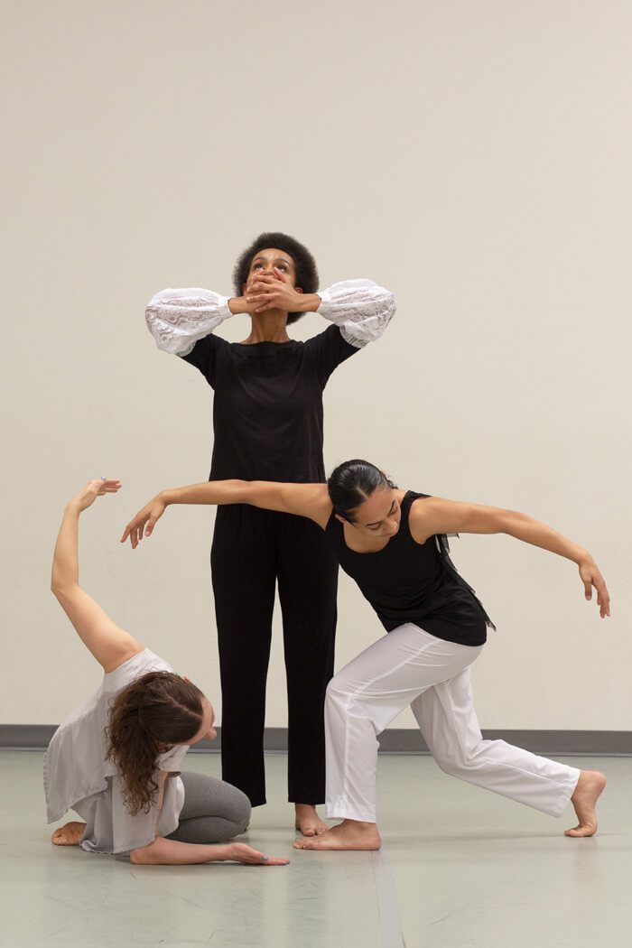 Three dancers in Keshet Dance Company's Movement for Mercy performance