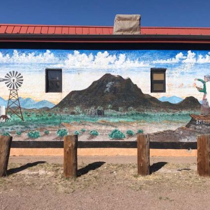 A mural by artist Eddie Tsosie (Navajo) on the exterior of La Posada Gallery.