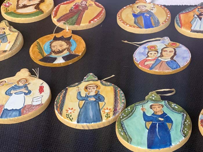 Painted retablos at the Traditional Spanish Market. 