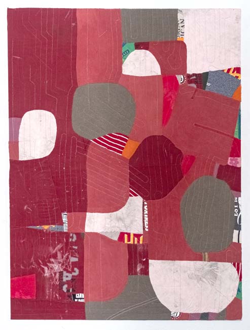 Abstraction in red, pink, and gray made of scraps of found fabric.