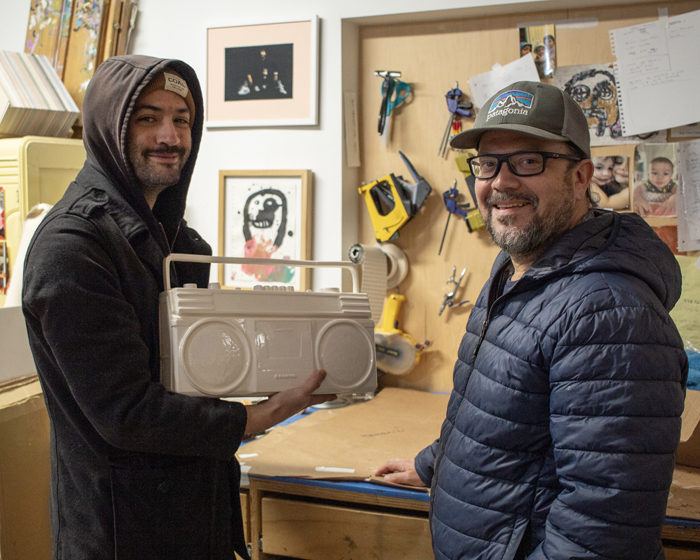 Horacio Rodriguez delivers a porcelain canvas to Andrew Alba