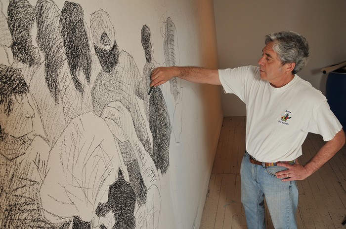 Tony Ortega sketching a mural installation at the Boulder Museum of Contemporary Art