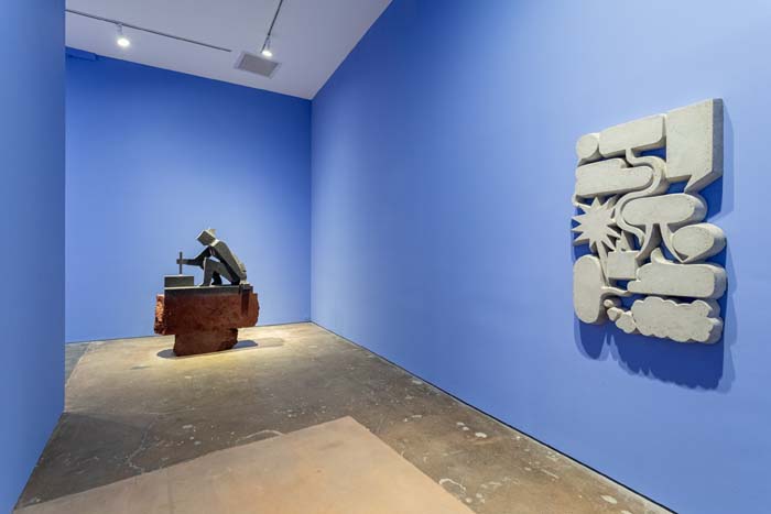 Installation view with blue walls