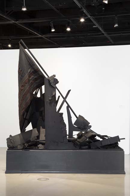 Sculpture by Benjamin Winans made of wood and a found church pew, arranged in the style of the famous Iwo Jima photograph
