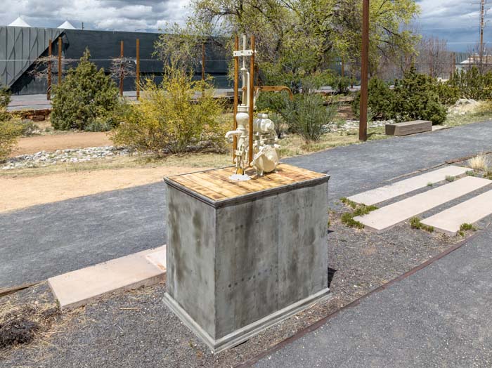 Installation of a water pump by M12 Studio in the Santa Fe Railyard Park, part of Going With the Flow.