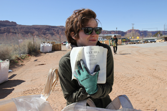 Noémie Despland-Lichtert jokes about using pages from a recycled Bible during the Moab Arts Reuse Residency 
