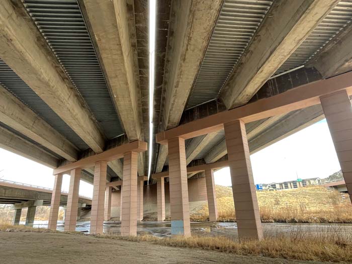 View under the I-25 bridge spanning Monument Creek in Colorado Springs.