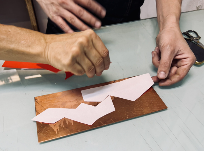 Ernesto Alva and Iris Barrera work on Barrera's next print at La Trampa Gráfica Contemporánea