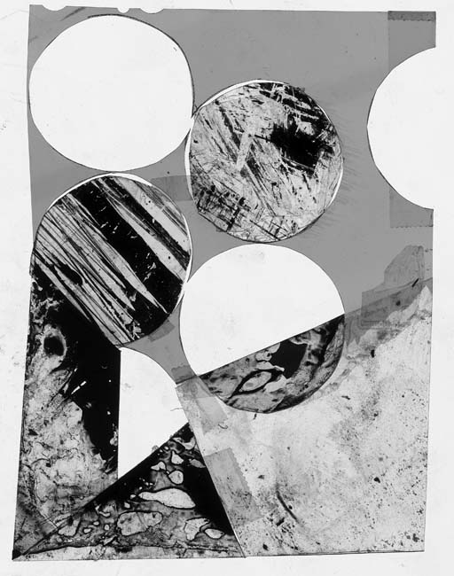 Black and white abstract photogram with circles and half circles and varying textures.