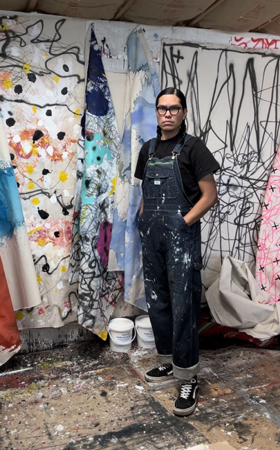 Patrick Dean Hubbell (Diné) stands in his studio in Navajo, Arizona