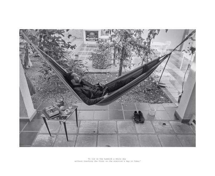 Black and white photograph of Reynier Leyva Novo lying in a hammock.