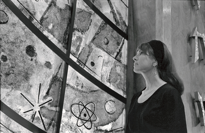 Rita Deanin Abbey in front of Wall of Creation