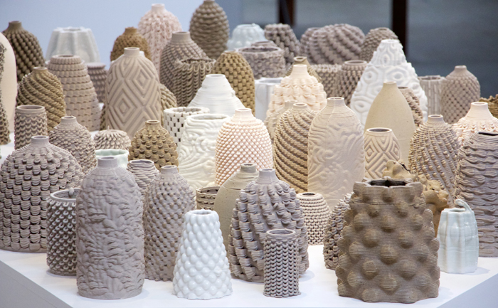 Ronald Rael and Emerging Objects, installation view of a group of 3D-printed ceramics