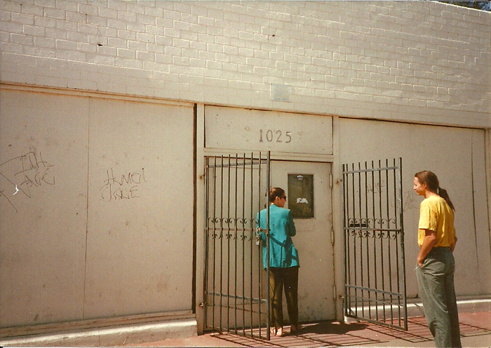 Beatrice Moore and Tony Zahn stand in front of 1025 Grand in 1992 before renovation