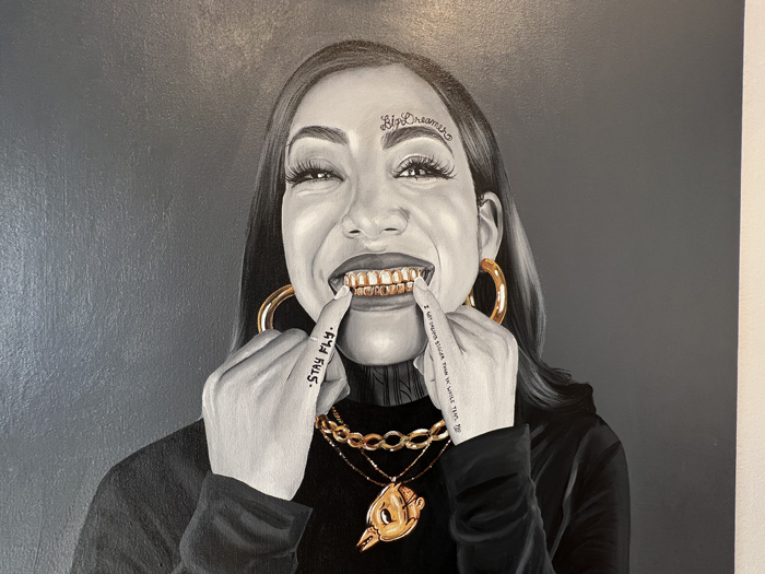 Antoinette Cauley, Stay Fly painting at Modified Arts, a women shows her grill