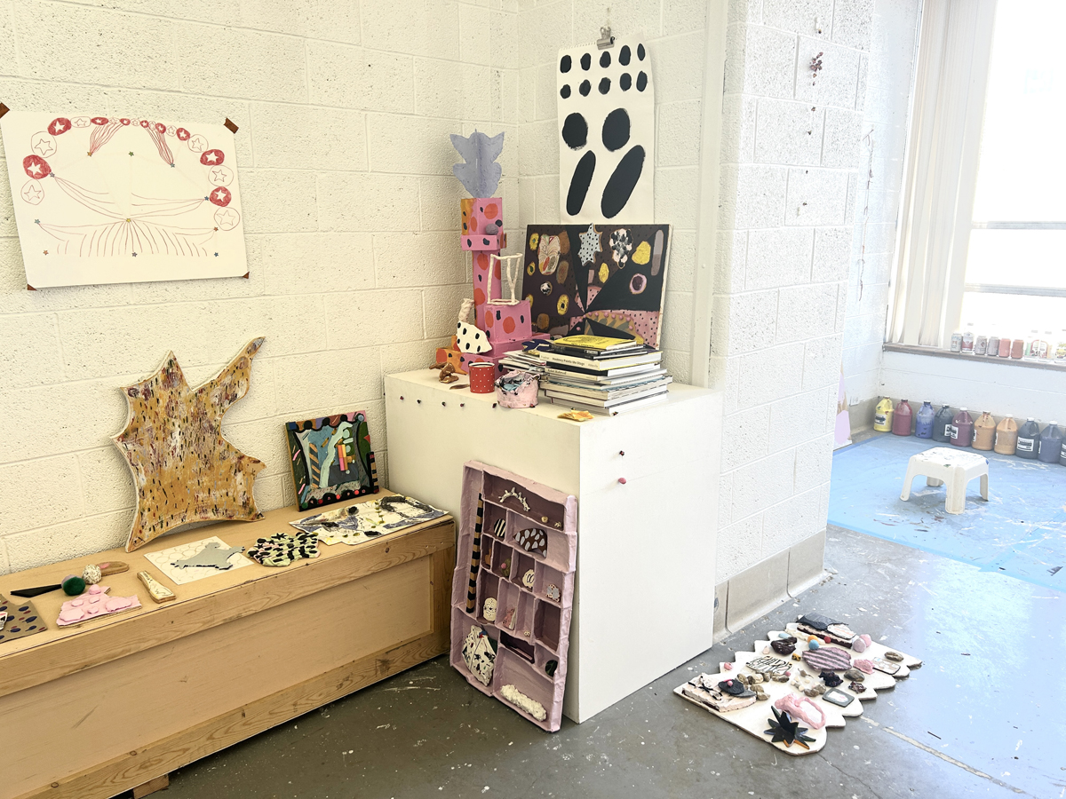 The studio of Claire Kennedy includes completed drawings and other objects