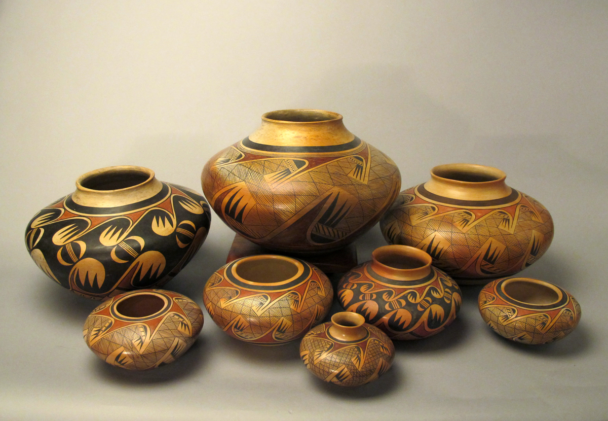 Selection of jars by Nampeyo and her daughter Fannie showing the Migration Design