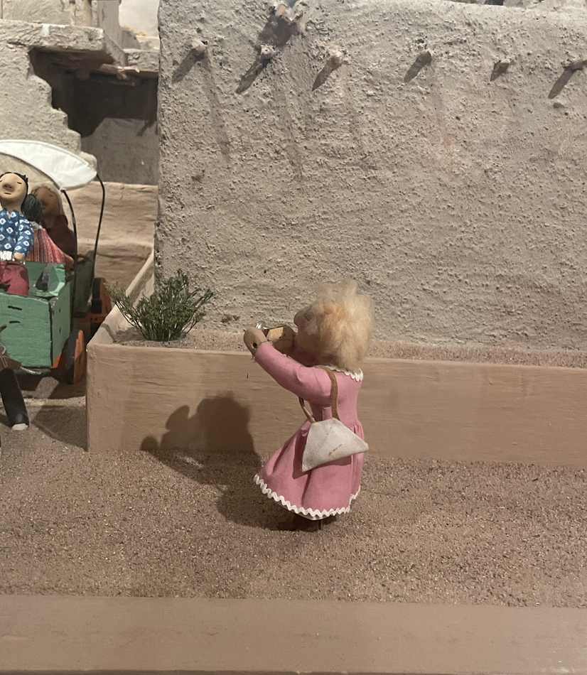 Museum of International Folk Art display blonde doll Pueblo Feast Day