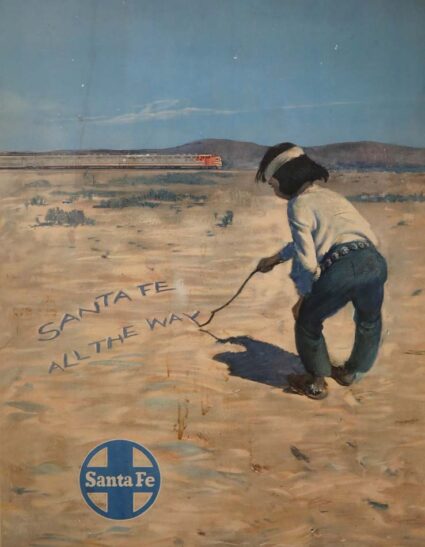 A young Diné boy, wearing dungarees with a concho belt and moccasins embellished with turquoise-studded silver stars, letters into the russet-tan dirt, with a stick, “Santa Fe All the Way.”