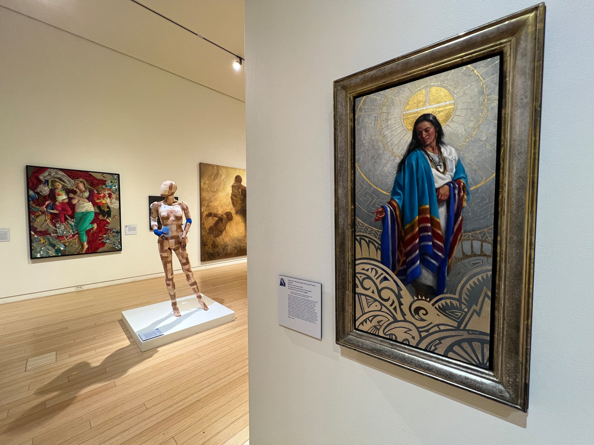 Installation view of Materializing Mormonism at Mesa Art Center shows artworks of various mediums in a gallery space. The show examines Mormonism in Arizona through an artistic lens.