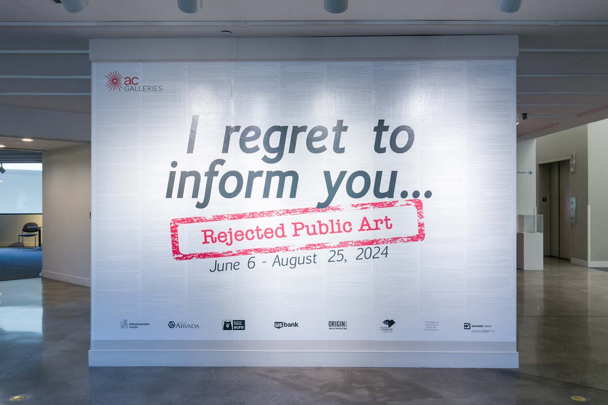 Exhibition signage for I Regret to Inform You: Rejected Public Art at the Arvada Center.