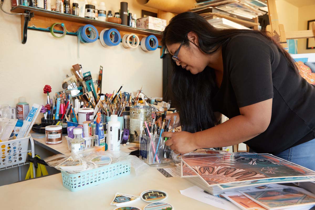 Mallery Quetawki working in her studio/office in Albuquerque, NM.