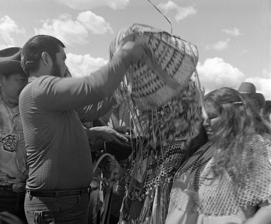 Historical image of a Ndee puberty ceremony. This image is featured in Woven from the Center, a new book on Native basketry by Diane Dittemore.