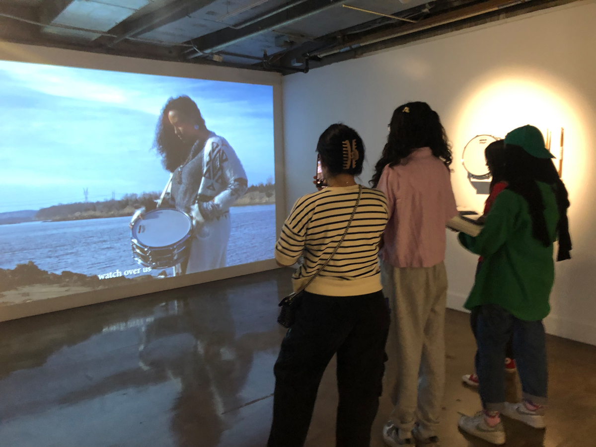 Hamrah Arts Club watching a video installation at Raven Chacon's exhibition at MOCA Tucson