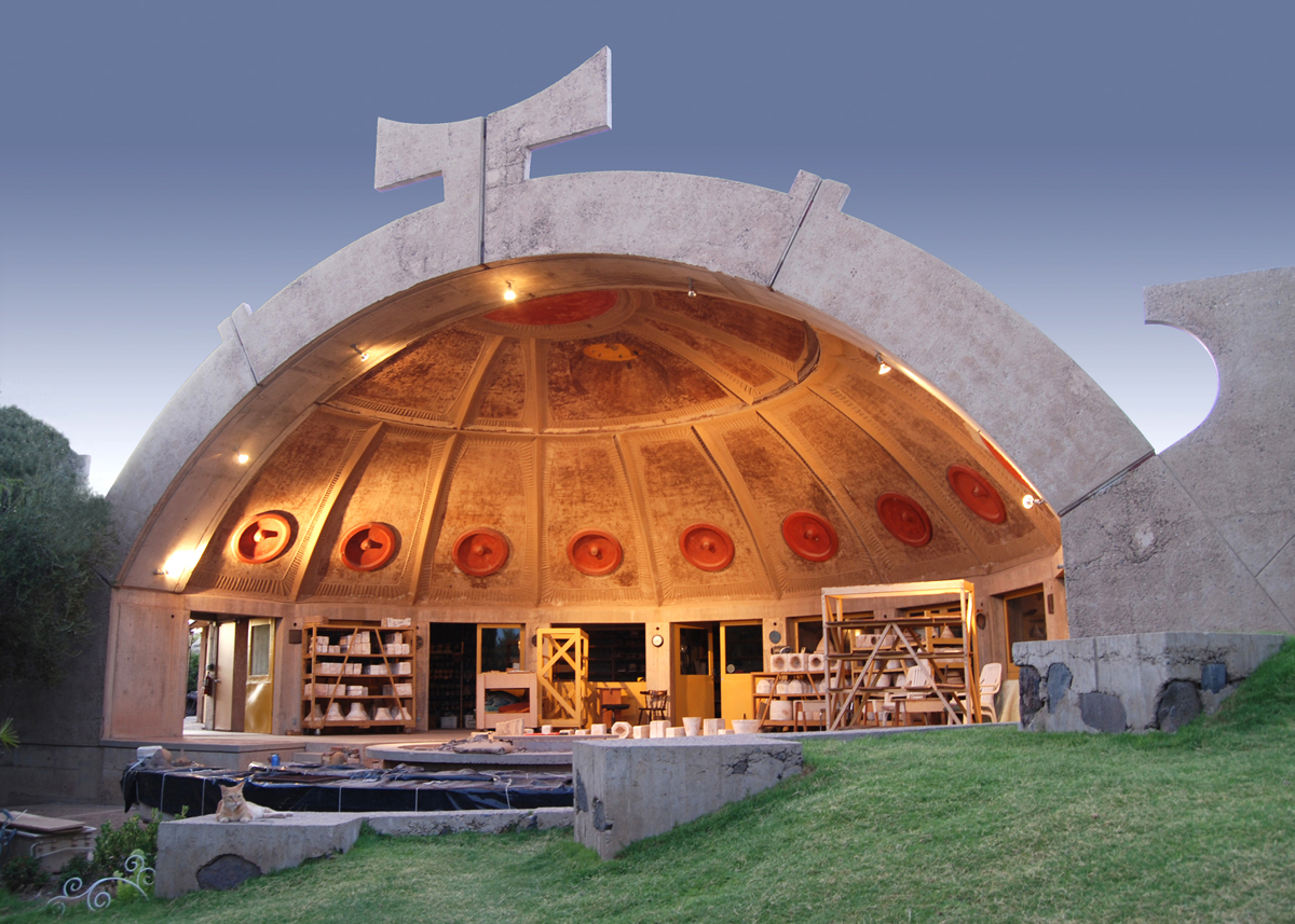 A massive half-dome structure made from concrete at Arcosanti in Arizona.