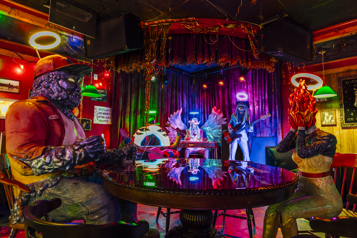 Strange sculptural figures populate a neon-lit jazz bar. Meow Wolf's new Houston location is a top Southwest art news headline November.