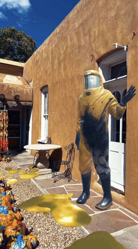 An AR image of a worker in a hazmat suit.