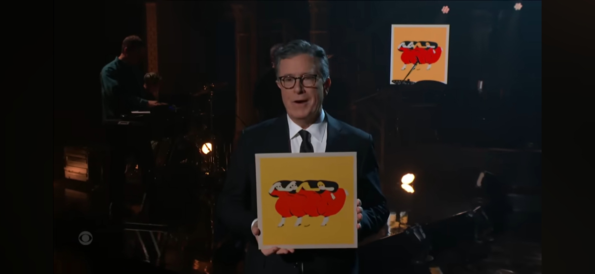 Screenshot of Stephen Colbert holding a Future Islands album cover designed by Albuquerque-based artist Beedallo.