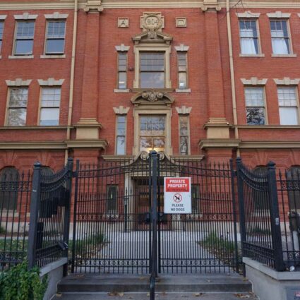 Evans School, a 1904 Classical and Colonial Revival-style schoolhouse in Denver’s Golden Triangle District at Acoma Street and West 11th Avenue, as it stood in October 2024.