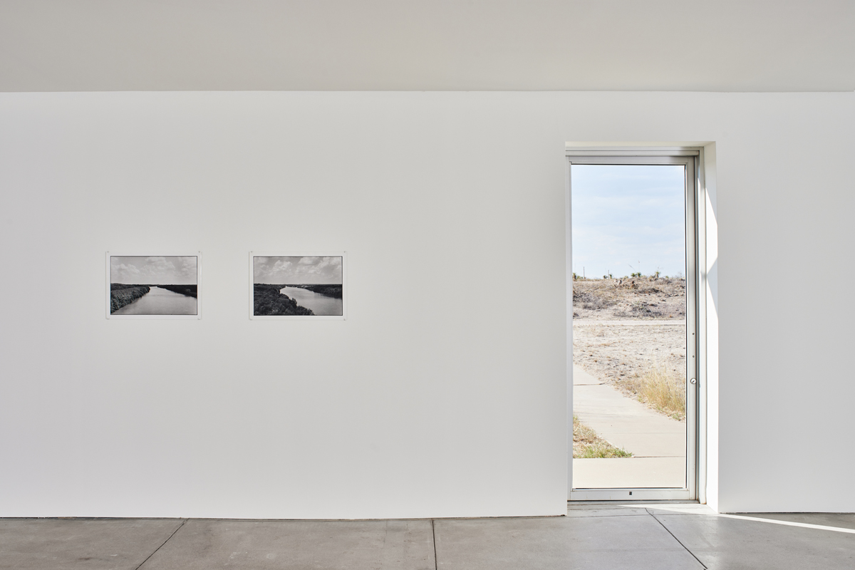 Installation view of photography show in a museum space. Zoe Leonard's Al rio/To the River series is on view at The Chinati Foundation in Marfa, Texas.