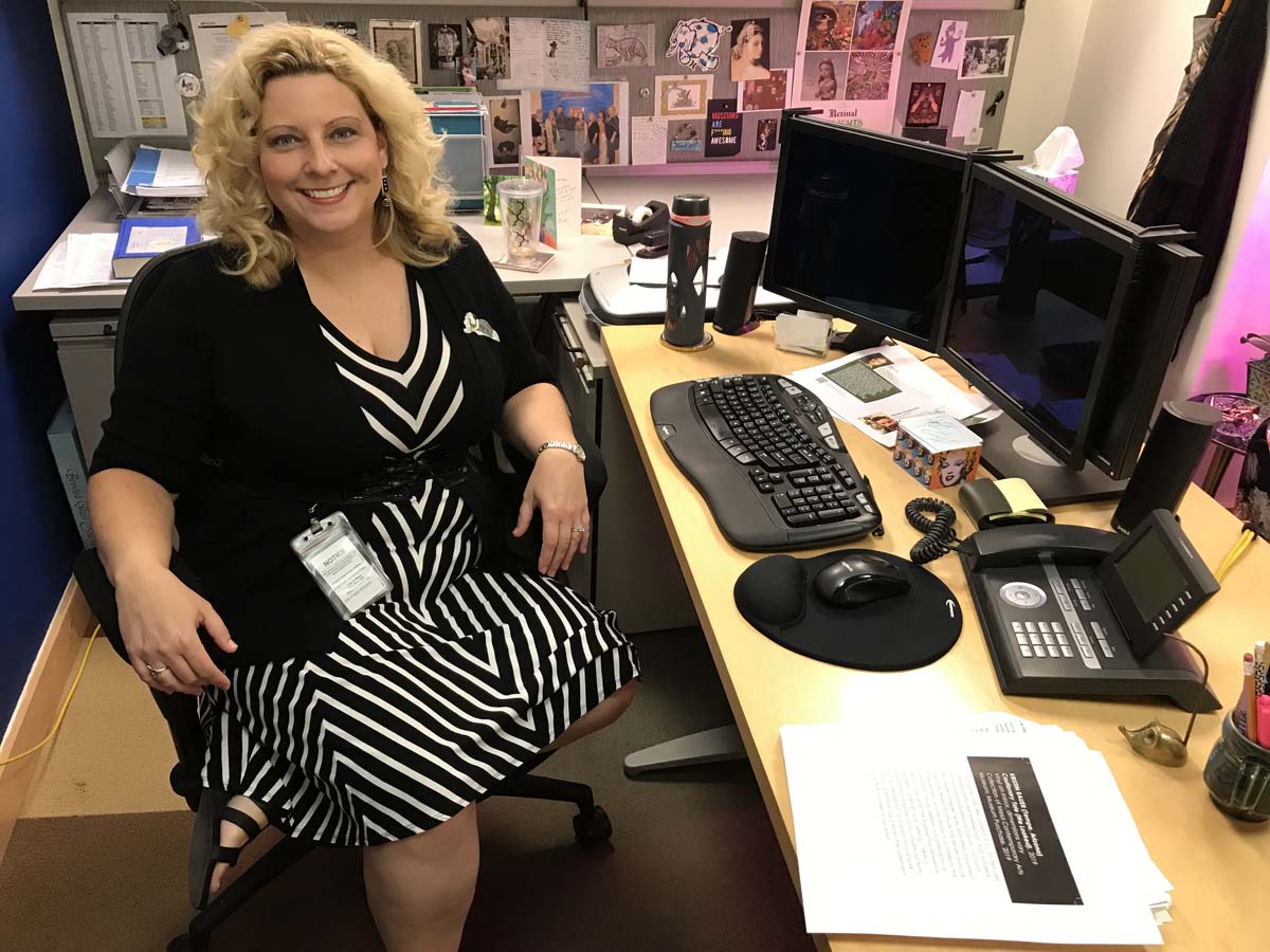 Tiffany Fairall sitting in her Mesa Contemporary Arts Museum office in 2019. 