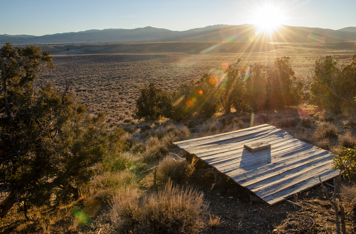 A cabin in a picturesque valley in rural Nevada at sunset. The Montello Foundation is just one of the Southwest artist residencies featured in Southwest Contemporary's Fall 2024-Winter 2025 guide to forthcoming residency deadlines.