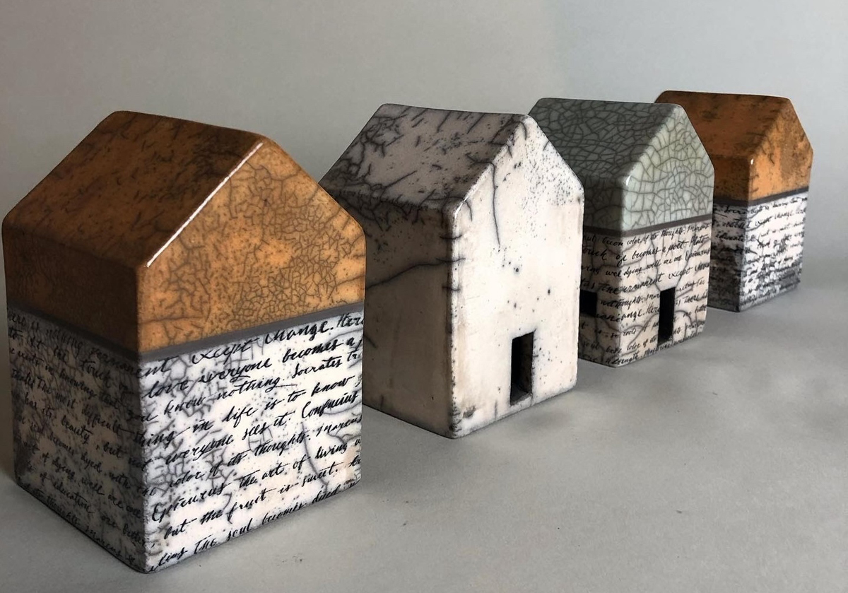 House-shaped ceramic art.