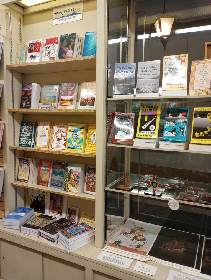 Indie books line the shelves of an independent bookstore in Albuquerque, New Mexico. Amador Publishers and Treasure House Books are part of a fresh wave of New Mexico Indie Book Publishing. 