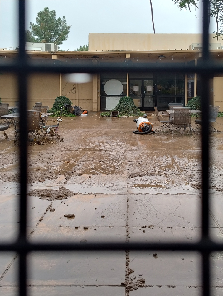 A mud-plastered courtyard at Roswell Museum. View imagery and read stories from the Roswell Museum flood.