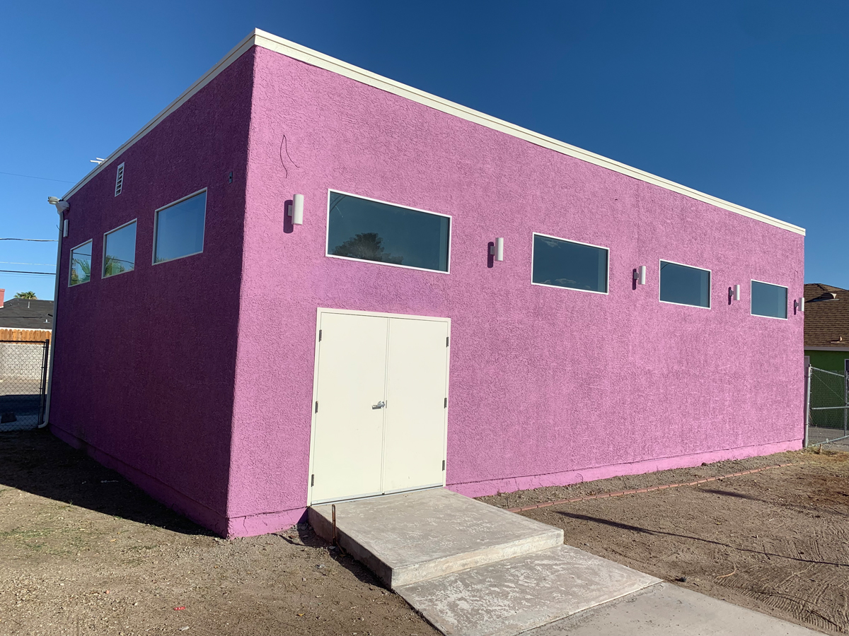 A pink building that's part of the Nuwu Art campus in downtown Las Vegas.