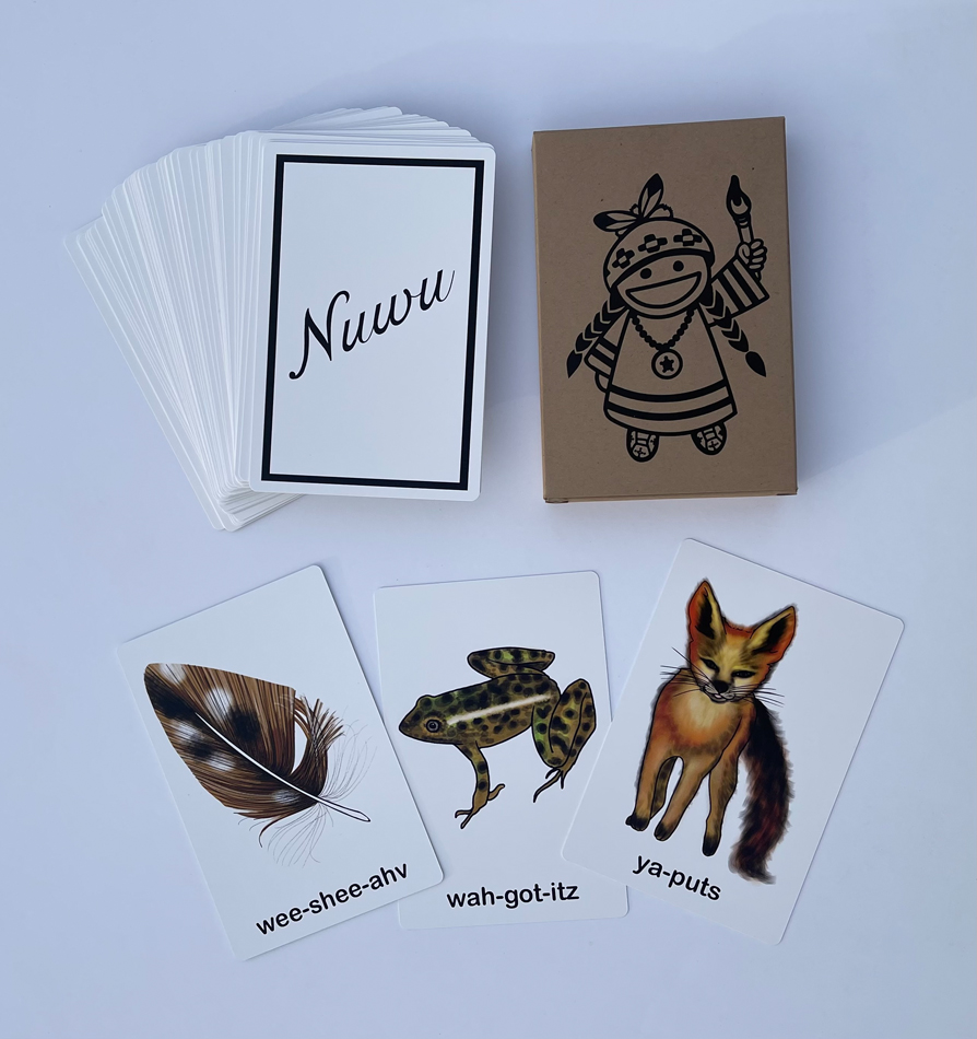 A fifty-four-card deck that is inscribed with the Southern Paiute language and culturally relevant images of Native American figures, including a feather, a frog, and a fox.