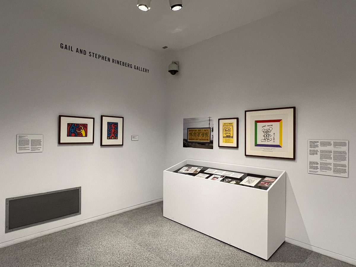 Installation view of colorful artworks in The Collection: Keith Haring at Phoenix Art Museum.