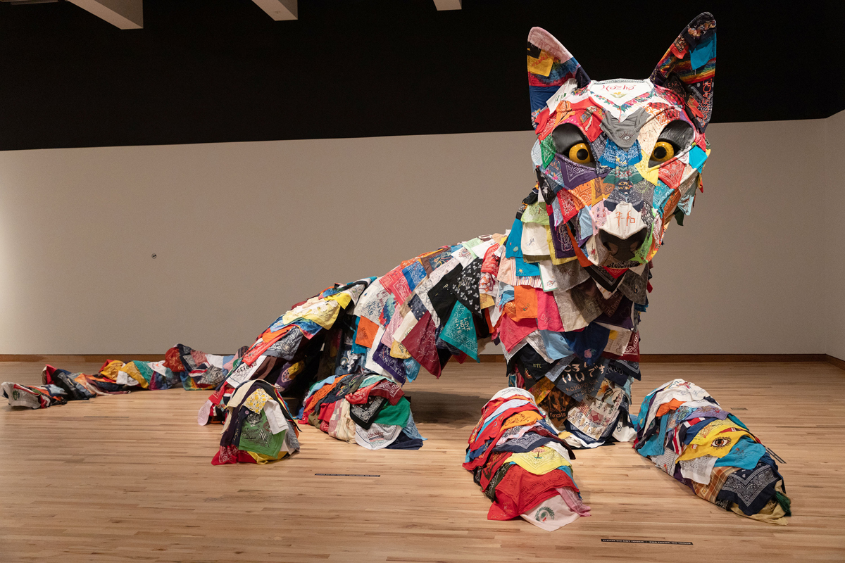 An animal made from colorful bandanas.