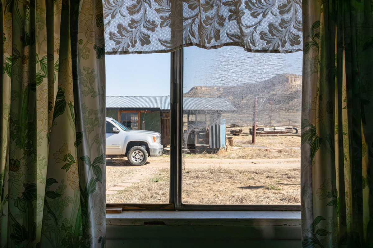 A view through the window of a home in Church Rock, New Mexico. By Shayla Blatchford for the Anti-Uranium Mapping Project.