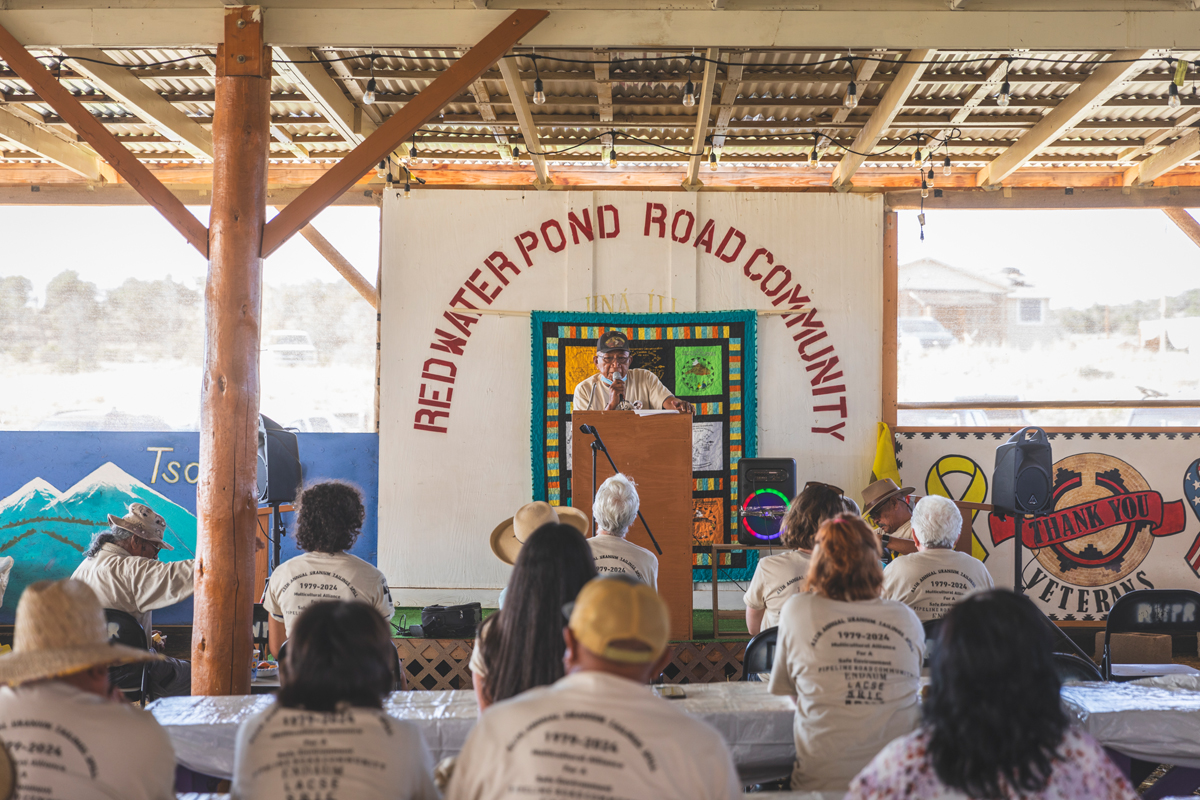 An anti-uranium activist speaks to the Red Water Pond Road Community Association. Photo by Shayla Blatchford for the Anti-Uranium Mapping Project.