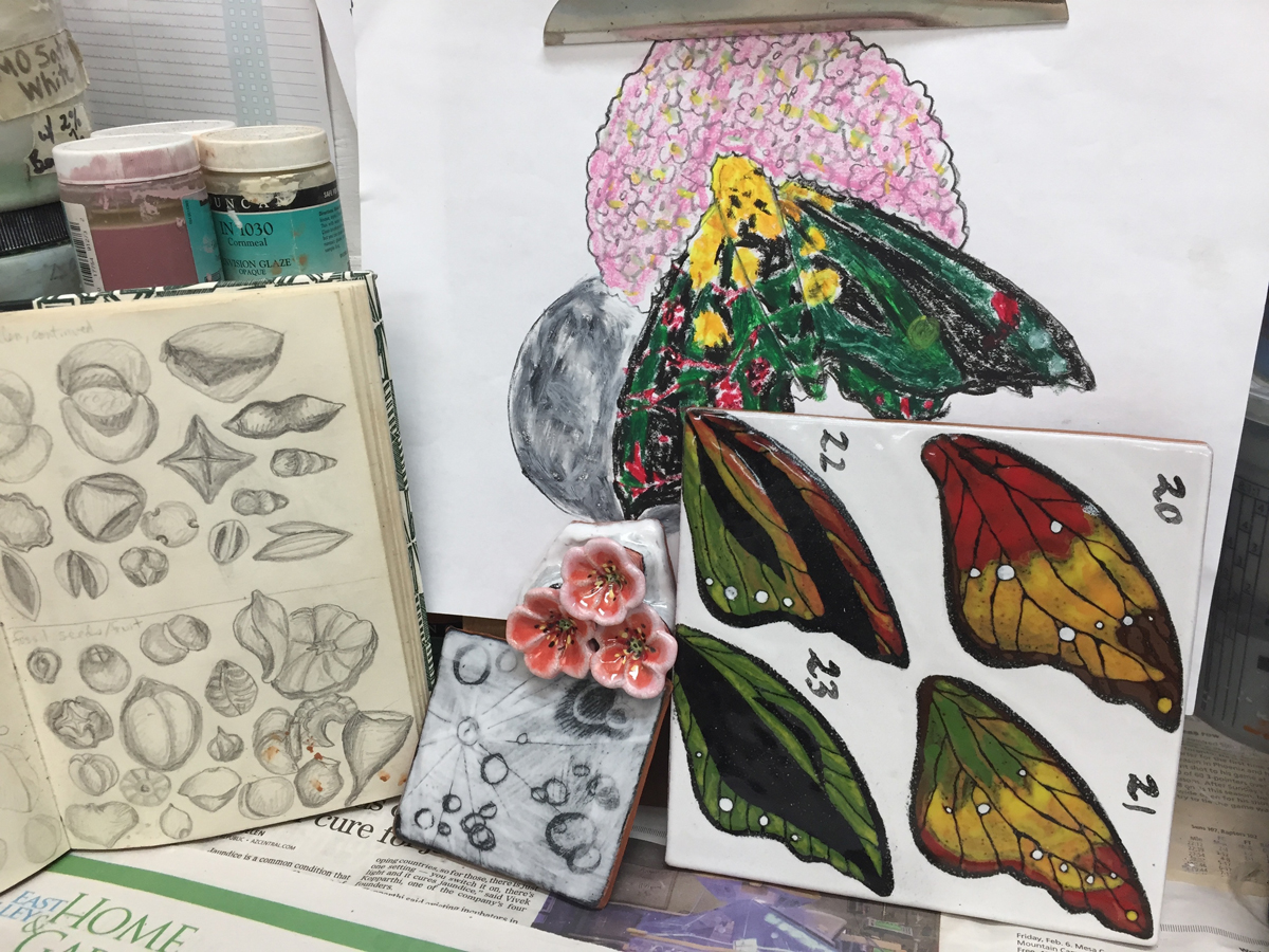 Farraday Newsome's studies for a ceramic artwork, including sketches and glaze tests.