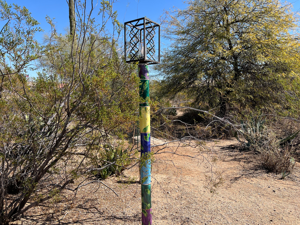 Ceramic lamppost by Farraday Newsome in a high-desert landscape.