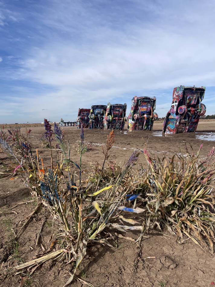Cadillac Ranch, with spraypainted grass in the foreground.